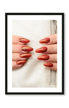 Manicure gel Polish-red cat eye Nail style on the white background