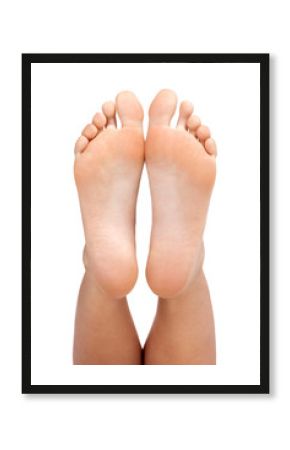 Closeup shot of female feet, isolated on white background