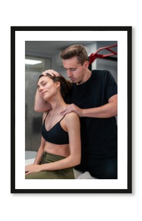 Male physiotherapist touching head and shoulder of woman with closed eyes during physiotherapy in hospital
