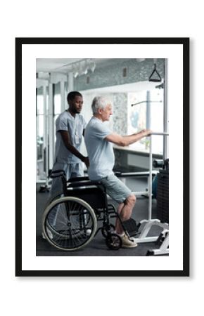 Full length portrait of senior man doing rehabilitation exercises in gym at medical clinic with therapist assisting