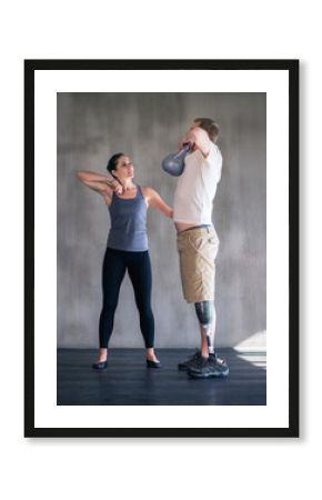 Devoted to my patients health. Shot of a female physiotherapist having a session with a young male amputee.