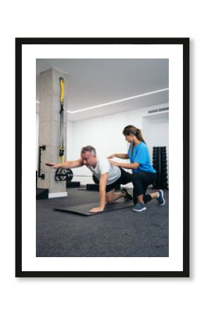 Man doing rehabilitation exercises with his physical therapist