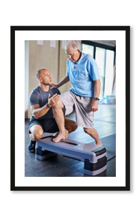 Just one more step. Cropped shot of a handsome personal trainer with a senior man.