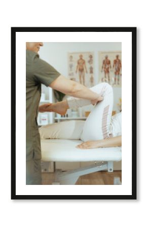 Therapist woman in massage cabinet conducting examination
