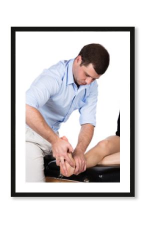 Physiotherapist massaging patient