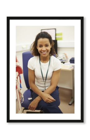 Portrait Of Female Physiotherapist In Hospital