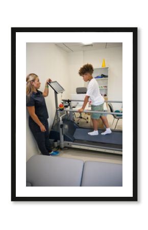Professional physiotherapist provides support to the patient