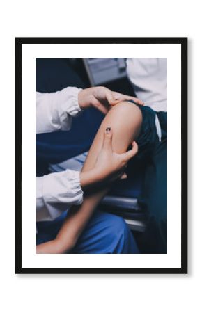 Rehabilitation therapy Professional male physiotherapists working in rehabilitation centers while treating male patients with leg and muscle pain.