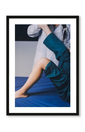 Rehabilitation therapy Professional male physiotherapists working in rehabilitation centers while treating male patients with leg and muscle pain.