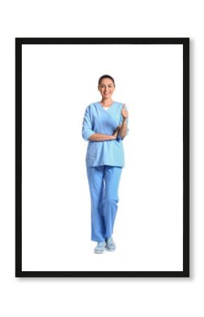 Female massage therapist showing thumb-up on white background