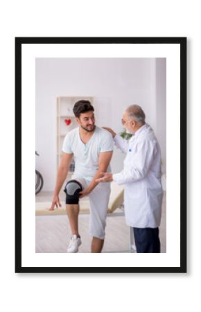 Young leg injured patient visiting old male doctor