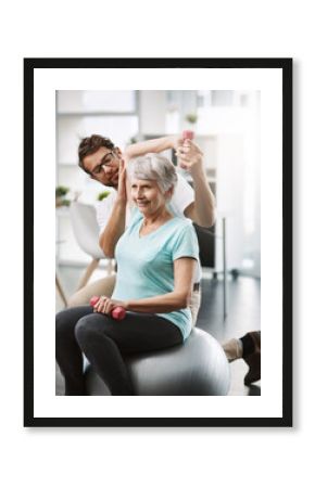 This shoulder is looking strong. Cropped shot of a young male physiotherapist working with a senior female patient.