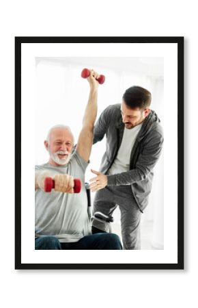 senior care exercise physical therapy exercising help assistence retirement home physiotherapy physiotherapist fitness gym strech band clinic therapist elderly man