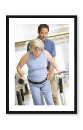 Physiotherapist With Patient In Rehabilitation