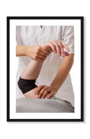 Orthopedist examining patient
