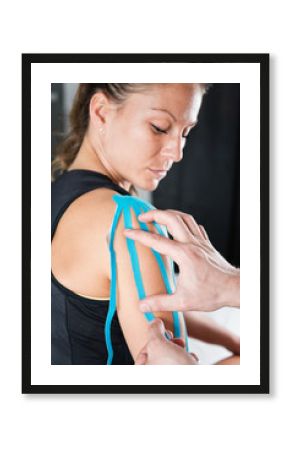 Shoulder treatment with kinesio tape