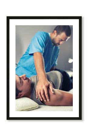 Physiotherapist Working With Patient Back