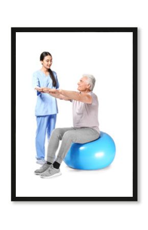 Young Asian physiotherapist working with mature man on white background