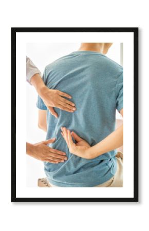 Close up of Physiotherapist working with patient in clinic