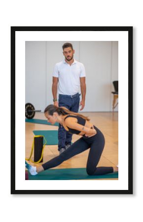 Rehabilitation exercises for legs in the gym. Physiotherapy and Osteopathy