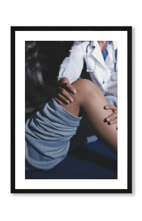 Rehabilitation therapy Professional male physiotherapists working in rehabilitation centers while treating male patients with leg and muscle pain.