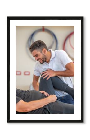 Rehabilitation exercises for legs in the gym. Physiotherapy and Osteopathy