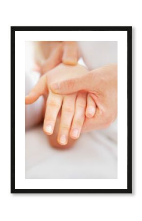Osteopath Treating Woman's Wrist, Close up view 