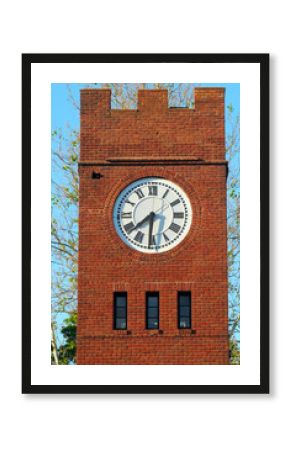 Vertical close-up of an old clock tower