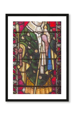 ROME, ITALY - MARCH 9. 2016: The St. Thomas Becket (from Canterbury) on the stained glass of All Saints' Anglican Church by workroom Clayton and Hall (19. cent.)