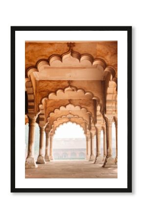 Row of columns and arches in Agra, India. Old beautiful Indian architecture