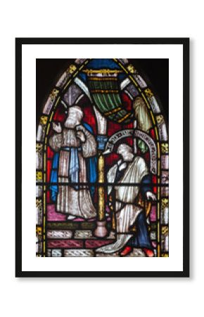 LONDON, GREAT BRITAIN - SEPTEMBER 19, 2017: The parable The Prayers of Pharisees and Tax Collectors in the temple on the stained glass in St Mary Abbot's church on Kensington High Street.