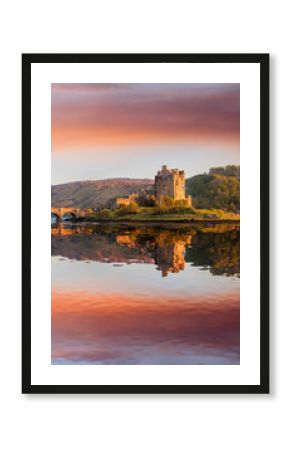 The Eilean Donan Castle with colorful sunset, Highlands of Scotland
