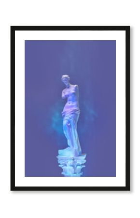 Gypsum statue of Venus de Milo with neon light