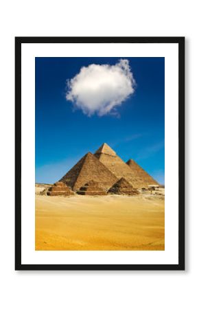 Egypt. Cairo - Giza. General view of pyramids from the Giza Plateau (from left: the Pyramid of Mykerinos, Chephren and Cheops and three small pyramids known as Queens' Pyramids on front side)