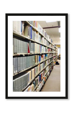 Rows of grey books at library