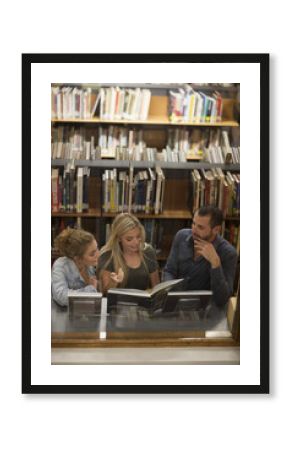 Students learning in a library