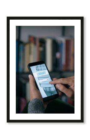 man searches on an online library with his phone