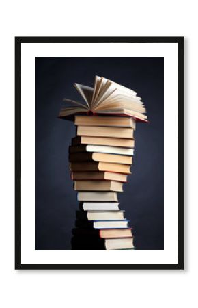 Pile of books on a black background