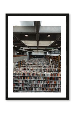Overlooking the countless books in the book stacks in the basement of a library 