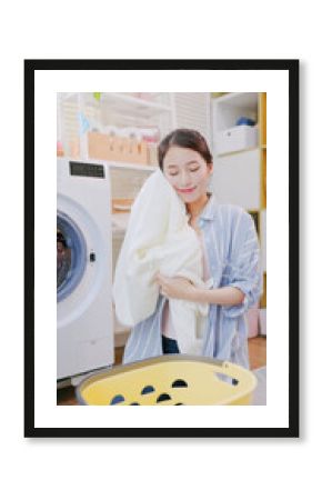 Asian housewife wash clothes