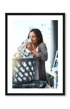 Woman, laundry scent and basket for clean towel in home, hygiene and fresh linen aroma. Female person, breathe and housework tasks on morning, check blanket and cleaner or maid for fragrance smell