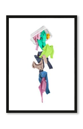 Clothing drops of laundry baskets isolated on white