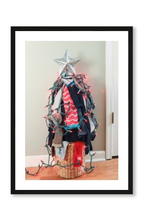 Old missing socks or laundry pile Christmas tree with lights