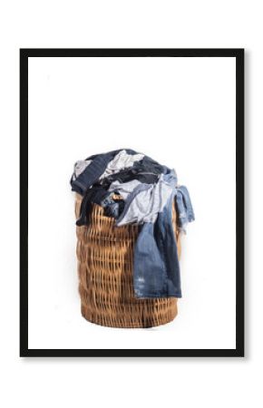 dirty laundry in whicker basket 