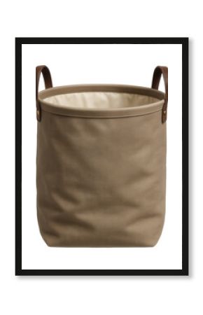 Canvas basket with a collapsible design for easy storage of laundry in a bathroom.