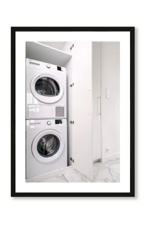 Modern washing machine and dryer pair in a stylish laundry space