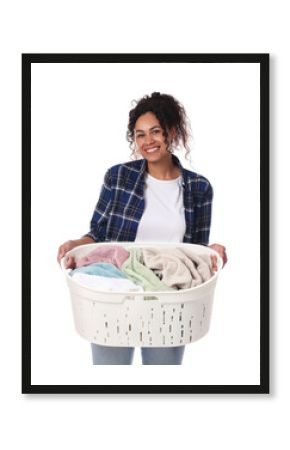 Happy woman with basket full of laundry on white background