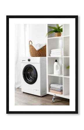 Laundry room with washing machine and basket with laundry