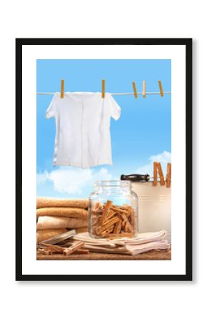 Laundry day with towels, clothespins on table