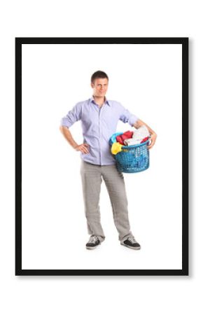 Young man holding a laundry basket